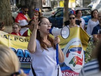 Activists are carrying banners and placards and shouting political slogans during a rally in Praca de Restauradores in Lisbon, Portugal, on...