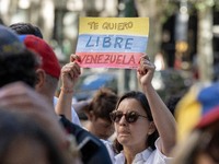 Activists are carrying banners and placards and shouting political slogans during a rally in Praca de Restauradores in Lisbon, Portugal, on...