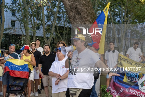 Activists are carrying banners and placards and shouting political slogans during a rally in Praca de Restauradores in Lisbon, Portugal, on...