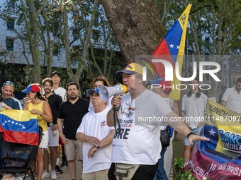 Activists are carrying banners and placards and shouting political slogans during a rally in Praca de Restauradores in Lisbon, Portugal, on...