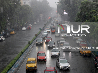 Vesicles are slowly moving following heavy monsoon rains in Kolkata, West Bengal, India, on August 17, 2024. (