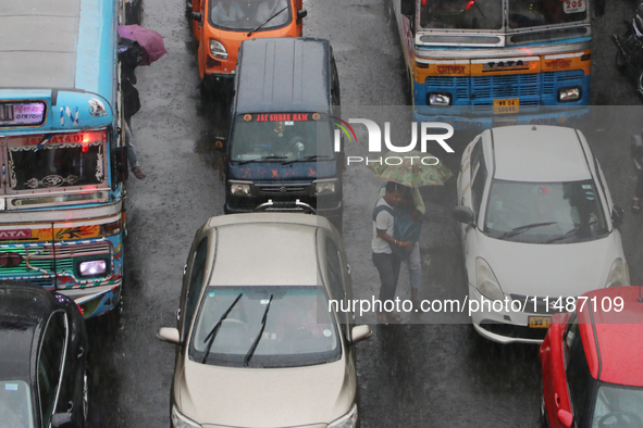 A view is showing a traffic jam following heavy monsoon rains in Kolkata, West Bengal, India, on August 17, 2024. 