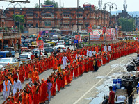 Hindu women devotees are carrying holy water as they take part in a 'Kalash Yatra' during the holy month of 'Sharvan', in Jaipur, Rajasthan,...