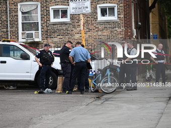 A male victim in his 30s is being shot in the neck and back and is being killed in Chicago, Illinois, United States, on August 17, 2024. At...