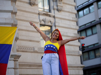 People take part in a protest called by the Venezuelan opposition for election 'victory' to be recognised in Porto, Portugal, on August 17,...