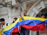 People take part in a protest called by the Venezuelan opposition for election 'victory' to be recognised in Porto, Portugal, on August 17,...