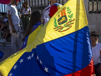 Members of the Venezuelan community are protesting the recent election results in Venezuela during a rally at Commerce Square in Lisbon, Por...