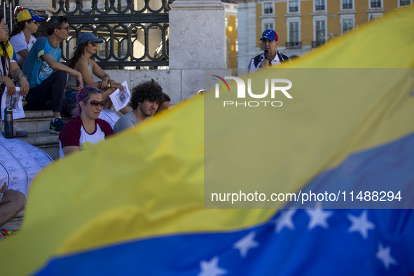 Members of the Venezuelan community are protesting the recent election results in Venezuela during a rally at Commerce Square in Lisbon, Por...