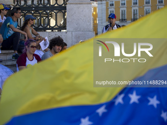 Members of the Venezuelan community are protesting the recent election results in Venezuela during a rally at Commerce Square in Lisbon, Por...