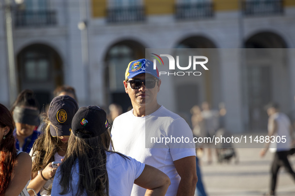 Members of the Venezuelan community are protesting the recent election results in Venezuela during a rally at Commerce Square in Lisbon, Por...