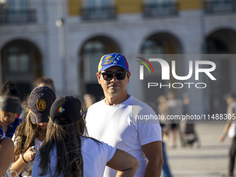 Members of the Venezuelan community are protesting the recent election results in Venezuela during a rally at Commerce Square in Lisbon, Por...