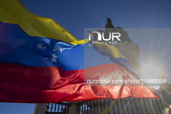 Members of the Venezuelan community are protesting the recent election results in Venezuela during a rally at Commerce Square in Lisbon, Por...