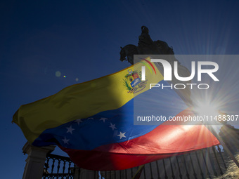 Members of the Venezuelan community are protesting the recent election results in Venezuela during a rally at Commerce Square in Lisbon, Por...