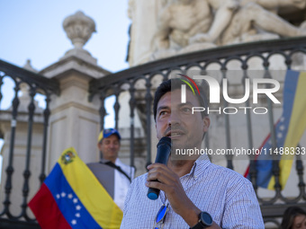 Tiago Mayan is talking to the Venezuelan community during a rally at Commerce Square in Lisbon, Portugal, on August 17, 2024. Opponents to t...