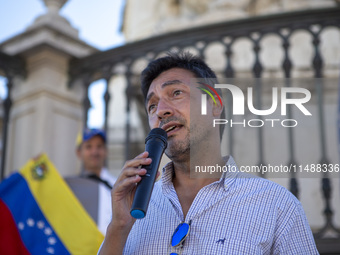 Tiago Mayan is talking to the Venezuelan community during a rally at Commerce Square in Lisbon, Portugal, on August 17, 2024. Opponents to t...