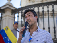 Tiago Mayan is talking to the Venezuelan community during a rally at Commerce Square in Lisbon, Portugal, on August 17, 2024. Opponents to t...