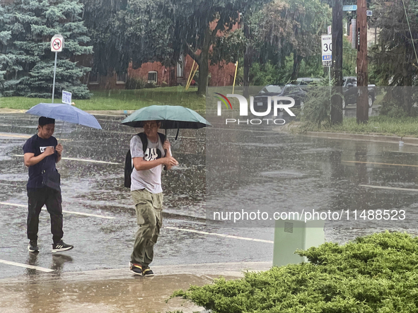 Severe thunderstorms are hitting Toronto, Ontario, Canada, on August 17, 2024. Environment and Climate Change Canada (ECCC) is issuing a rai...