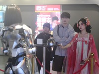 An intelligent bionic ''beauty'' robot is performing and interacting with citizens to answer questions at a shopping mall in Hangzhou, China...