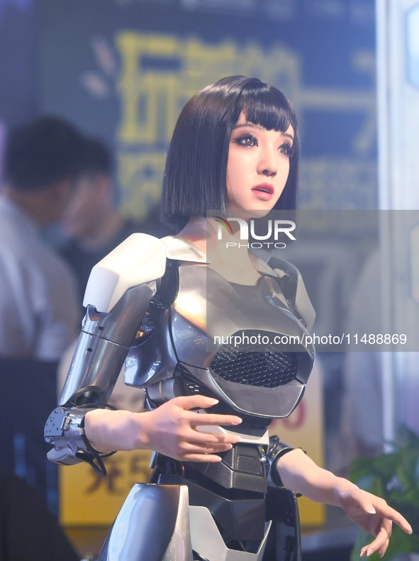 An intelligent bionic ''beauty'' robot is performing and interacting with citizens to answer questions at a shopping mall in Hangzhou, China...