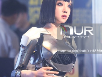 An intelligent bionic ''beauty'' robot is performing and interacting with citizens to answer questions at a shopping mall in Hangzhou, China...