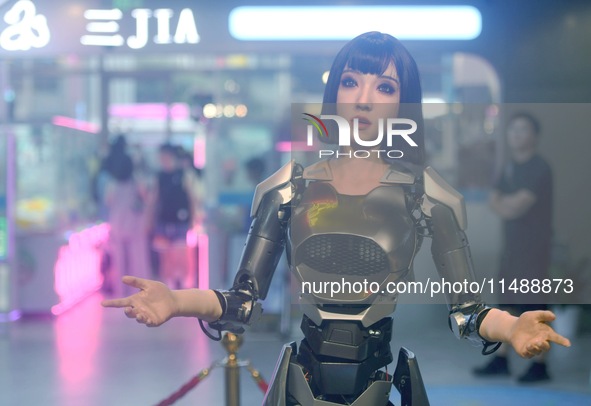 An intelligent bionic ''beauty'' robot is performing and interacting with citizens to answer questions at a shopping mall in Hangzhou, China...