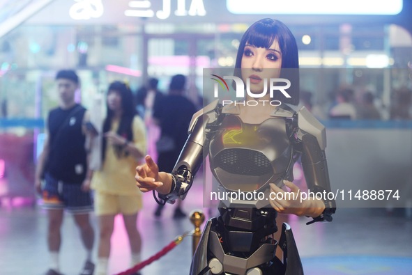 An intelligent bionic ''beauty'' robot is performing and interacting with citizens to answer questions at a shopping mall in Hangzhou, China...