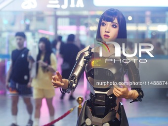 An intelligent bionic ''beauty'' robot is performing and interacting with citizens to answer questions at a shopping mall in Hangzhou, China...