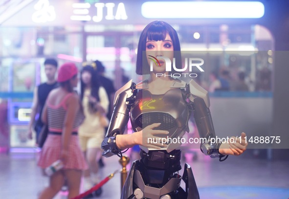 An intelligent bionic ''beauty'' robot is performing and interacting with citizens to answer questions at a shopping mall in Hangzhou, China...