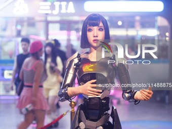 An intelligent bionic ''beauty'' robot is performing and interacting with citizens to answer questions at a shopping mall in Hangzhou, China...