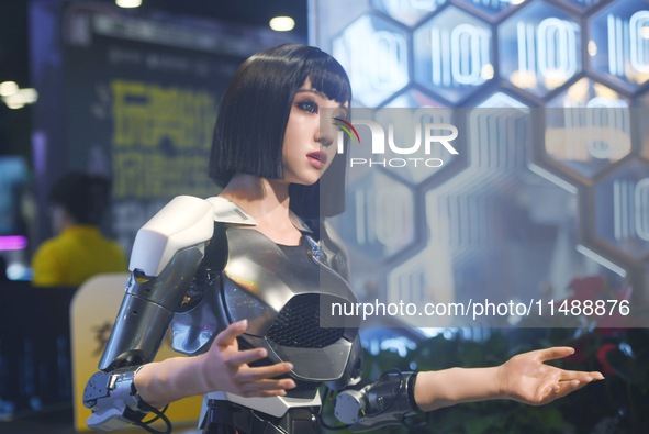 An intelligent bionic ''beauty'' robot is performing and interacting with citizens to answer questions at a shopping mall in Hangzhou, China...