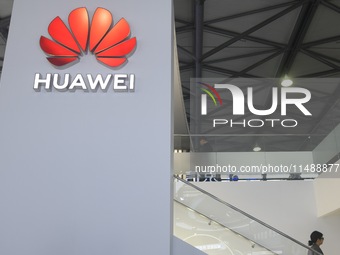 Visitors are visiting Huawei's stand at the Mobile World Congress 2024 in Shanghai, China, on June 26, 2024. (