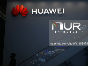 Visitors are visiting Huawei's stand at the Mobile World Congress 2024 in Shanghai, China, on June 26, 2024. (