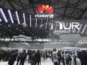 Visitors are visiting Huawei's stand at the Mobile World Congress 2024 in Shanghai, China, on June 26, 2024. (