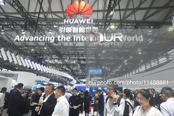 Visitors are visiting Huawei's stand at the Mobile World Congress 2024 in Shanghai, China, on June 26, 2024. 