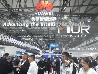 Visitors are visiting Huawei's stand at the Mobile World Congress 2024 in Shanghai, China, on June 26, 2024. (