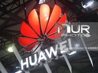 Visitors are visiting Huawei's stand at the Mobile World Congress 2024 in Shanghai, China, on June 26, 2024. (