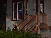 One teenager is dead and another teenager is injured after they are shot at while on a porch in Chicago, Illinois, United States, on August...