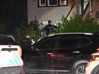 One teenager is dead and another teenager is injured after they are shot at while on a porch in Chicago, Illinois, United States, on August...