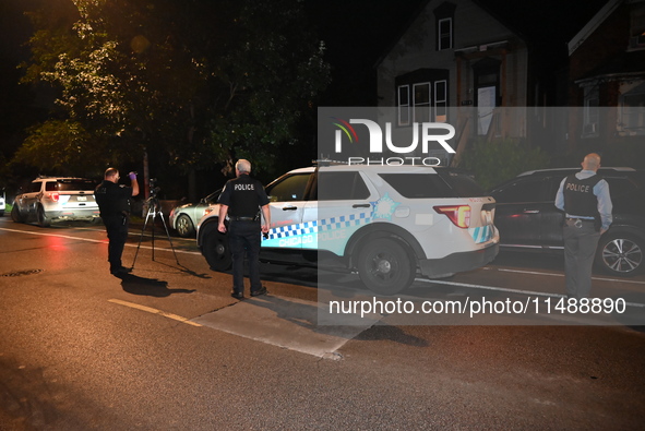 One teenager is dead and another teenager is injured after they are shot at while on a porch in Chicago, Illinois, United States, on August...