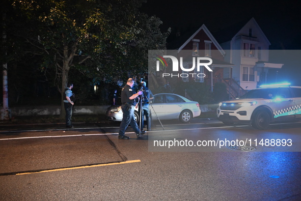 One teenager is dead and another teenager is injured after they are shot at while on a porch in Chicago, Illinois, United States, on August...