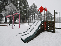 A snow-covered playground is being seen during heavy snowfall in Springfield, in the Selwyn District of Canterbury, in the South Island, New...