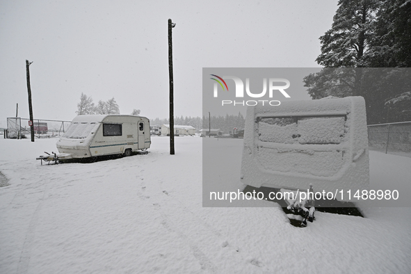 A snow-covered camper van park is being seen during heavy snowfall in Springfield, in the Selwyn District of Canterbury, in the South Island...