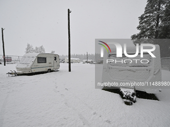 A snow-covered camper van park is being seen during heavy snowfall in Springfield, in the Selwyn District of Canterbury, in the South Island...