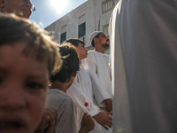 Devotees from a Sufi order are dancing and chanting spiritual songs during the annual procession of Sidi Bou Said in Ariana, Tunisia, on Aug...