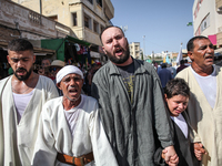 Devotees from a Sufi order are dancing and chanting spiritual songs during the annual procession of Sidi Bou Said in Ariana, Tunisia, on Aug...