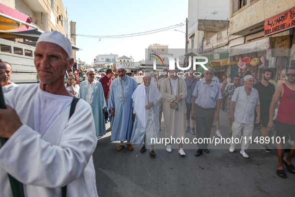 The Sheikhs (an Arabic title of honour given to long-standing spiritual leaders) are leading the annual procession of Sidi Bou Said in Arian...