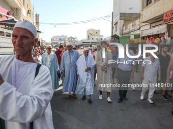 The Sheikhs (an Arabic title of honour given to long-standing spiritual leaders) are leading the annual procession of Sidi Bou Said in Arian...