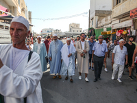 The Sheikhs (an Arabic title of honour given to long-standing spiritual leaders) are leading the annual procession of Sidi Bou Said in Arian...