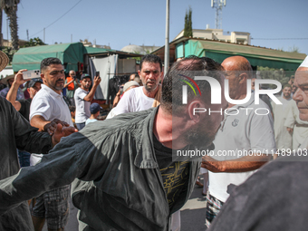 A devotee from a Sufi order is entering a state of trance during the annual procession of Sidi Bou Said in Ariana, Tunisia, on August 11, 20...