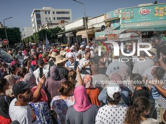 People are attending the procession of Sidi Bou Said held in Ariana, Tunisia, on August 11, 2024. The annual procession (Arab: Kharja) known...